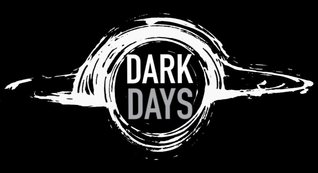 White coffee ring with Dark Days text on black background